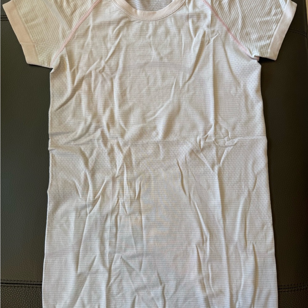 lululemon athletica light pink swiftly tech (hip length) size 4
